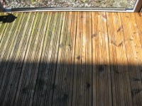 after powerwashing scrubbing decking